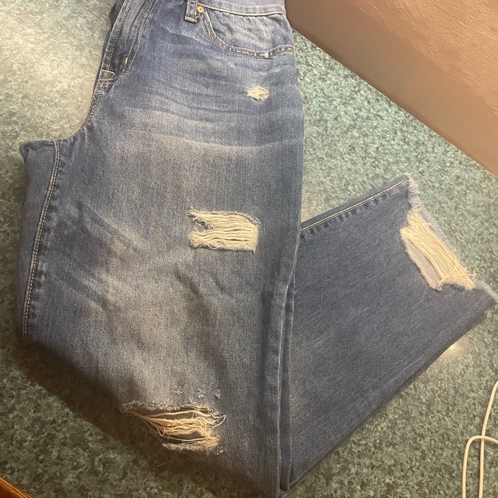 Juniors high rise distressed denim jeans
